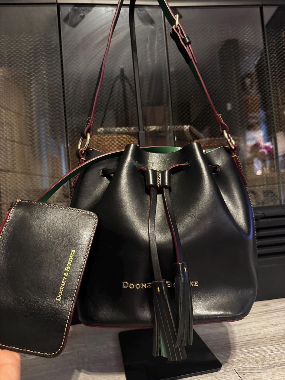 Dooney and Bourke smooth drawstring black green leather Serena Bucket bag purse